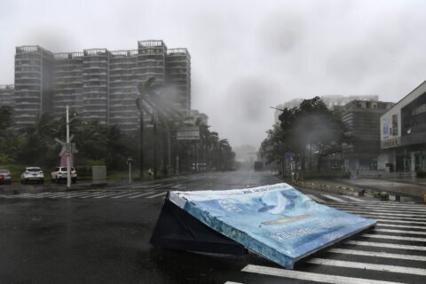 Vietnam orders evacuations and closes airports as Typhoon Yagi is set to make landfall