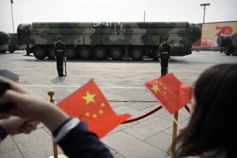 China test-fires an intercontinental ballistic missile into the Pacific Ocean