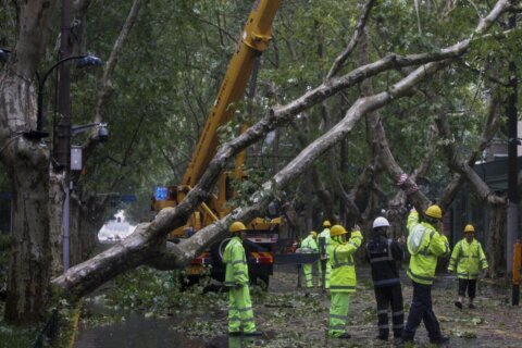 2 people reported dead in China as Typhoon Bebinca is downgraded to a tropical storm