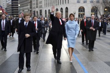 Donald Trump and Melanie walk down Pennsylvania Avenue