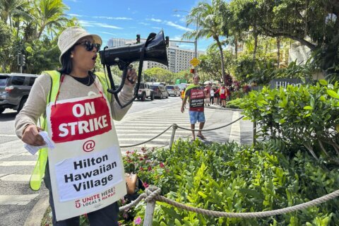 Union workers at Hawaii’s largest hotel go on strike