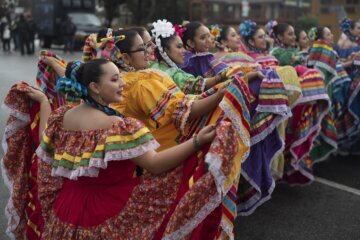 Dancers in colorful dresses.
