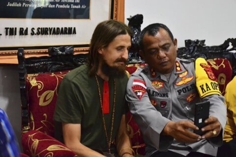 A New Zealand pilot is freed after 19 months in rebel captivity in Indonesia's Papua region