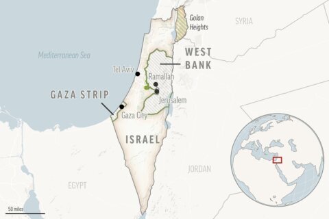 Israeli medics say 3 people were killed in a shooting attack at the West Bank-Jordan border crossing