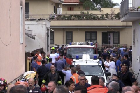 Building collapse in Italy kills 2 young siblings and their mother