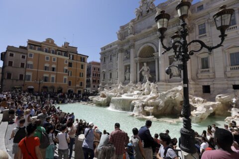 Rome considers imposing a fee to discourage crowds and plunges at Trevi Fountain