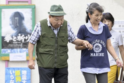 Japanese court acquits the longest-serving death row inmate of a 1966 quadruple murder