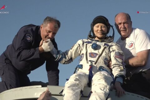 2 record-breaking Russians and an American who lived on space station for 6 months return to Earth