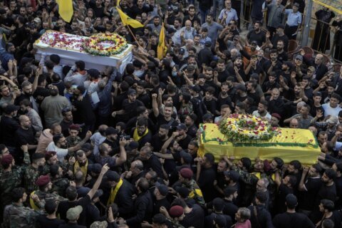 Hezbollah leader vows retaliation against Israel for attacks on devices as both sides trade strikes