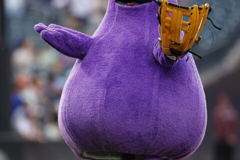 Purple place: Mets unveil the new Grimace seat at Citi Field