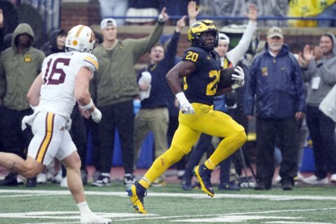 No. 12 Michigan holds off Minnesota in 4th quarter to win 27-24 and retain Little Brown Jug