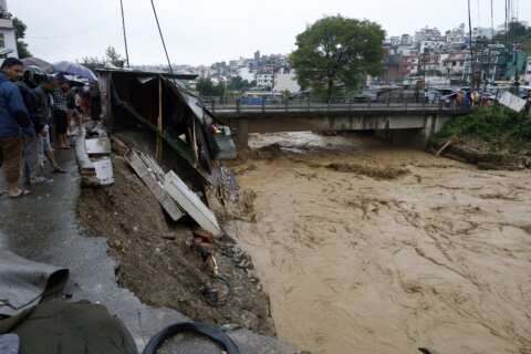 At least 129 are dead in floods and landslides in Nepal