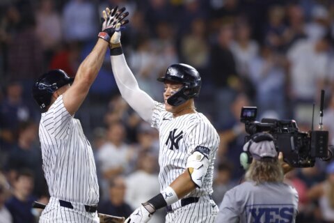 Yankees win AL East title with 10-1 victory over Orioles behind Judge, Stanton and Cole