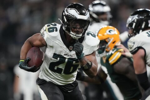 Barkley scores 3 TDs as Eagles beat Packers 34-29 in Brazil. Packers’ Love injured in final minute