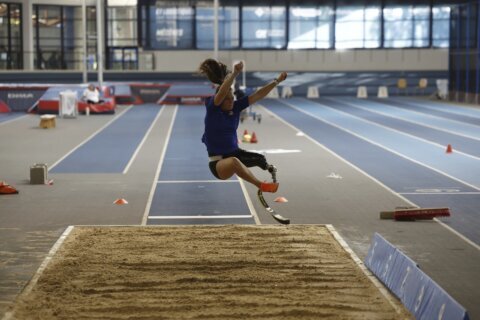 New to long jump, U.S. Paralympians Lambert and Wallace form unlikely partnership