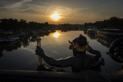 Paralympic triathlon events are postponed for a day because of poor water quality in the Seine River