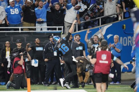 Jared Goff makes 1st NFL TD reception and throws for 2 TDs in Lions’ 42-29 win over Seahawks