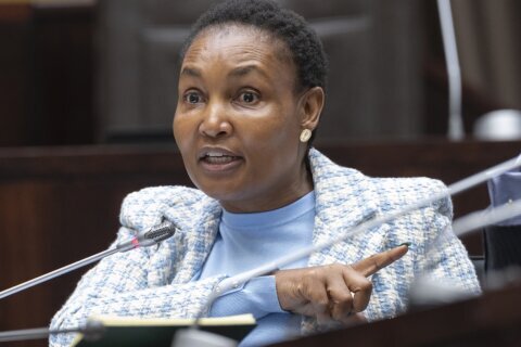 South Africa's justice minister denies corruption allegations against her in a mutual bank scandal