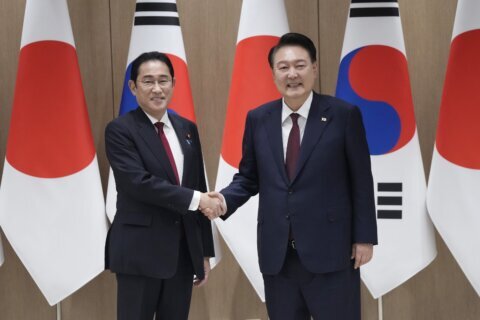 Japan's leader makes a farewell visit to Seoul and reaffirms sympathy for Korean colonial victims