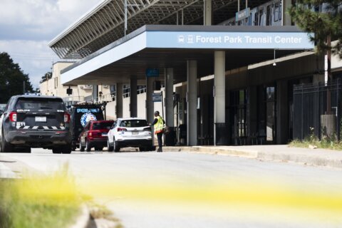 4 people killed on Chicago-area L train likely didn't even see the shooter, official says