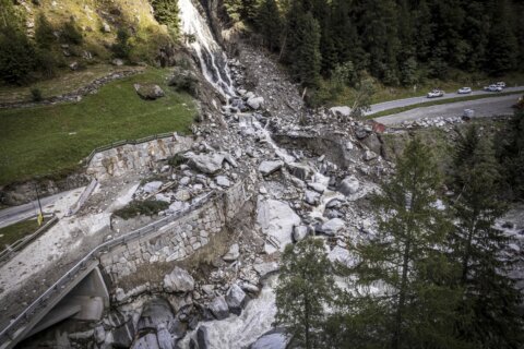 Tourists helicoptered down from Swiss mountain resort after mudslide cuts off road access