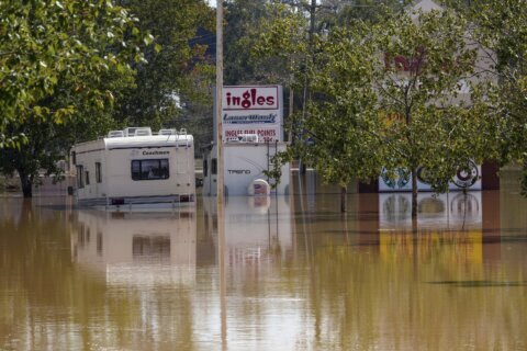 The Latest: Helene’s death toll rises to more than 130 as Biden announces North Carolina visit