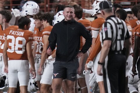 Texas QB Ewers back in practice but still questionable for No. 1 Longhorns' SEC opener