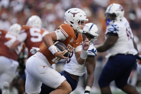 Arch Manning takes over for injured Quinn Ewers, leads No. 2 Texas to 56-7 rout of UTSA