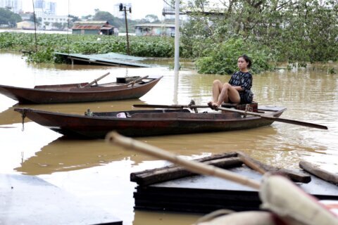 Flash flood sweeps away hamlet as Vietnam's storm toll rises to 155 dead