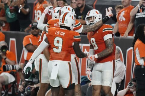 No. 7 Miami survives Virginia Tech 38-34 to remain unbeaten after Hail Mary TD overturned