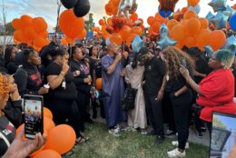 Mourners honored Justin Robinson at a candlelight vigil