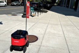 This small robot trundles down D.C. sidewalks snapping pictures. It's part of a pilot program thats helping D.C.s Department of Transportation update its inventory of street signs. (WTOP/Scott Gelman)