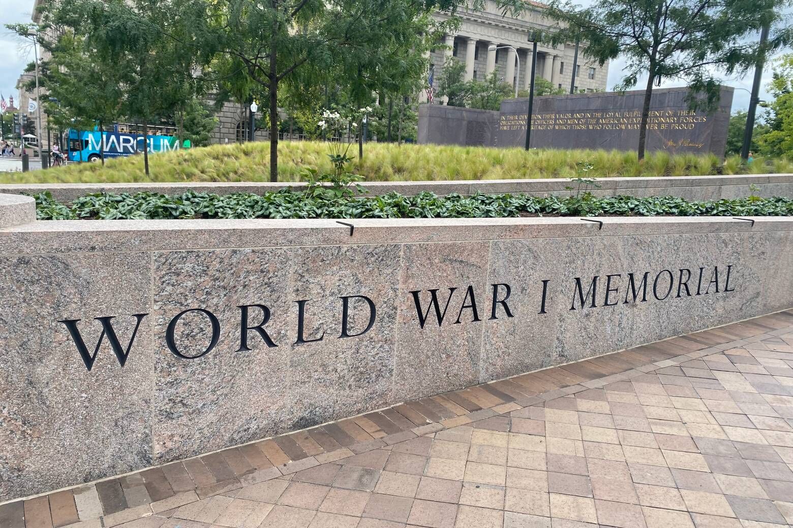 The new World War I Memorial in D.C. is a 3-acre site sitting along Pennsylvania Avenue between the White House and Freedom Plaza. The centerpiece is a 60-foot wall of sculptures, which aim to tell a story from the start of the war to the end. (WTOP/John Domen)