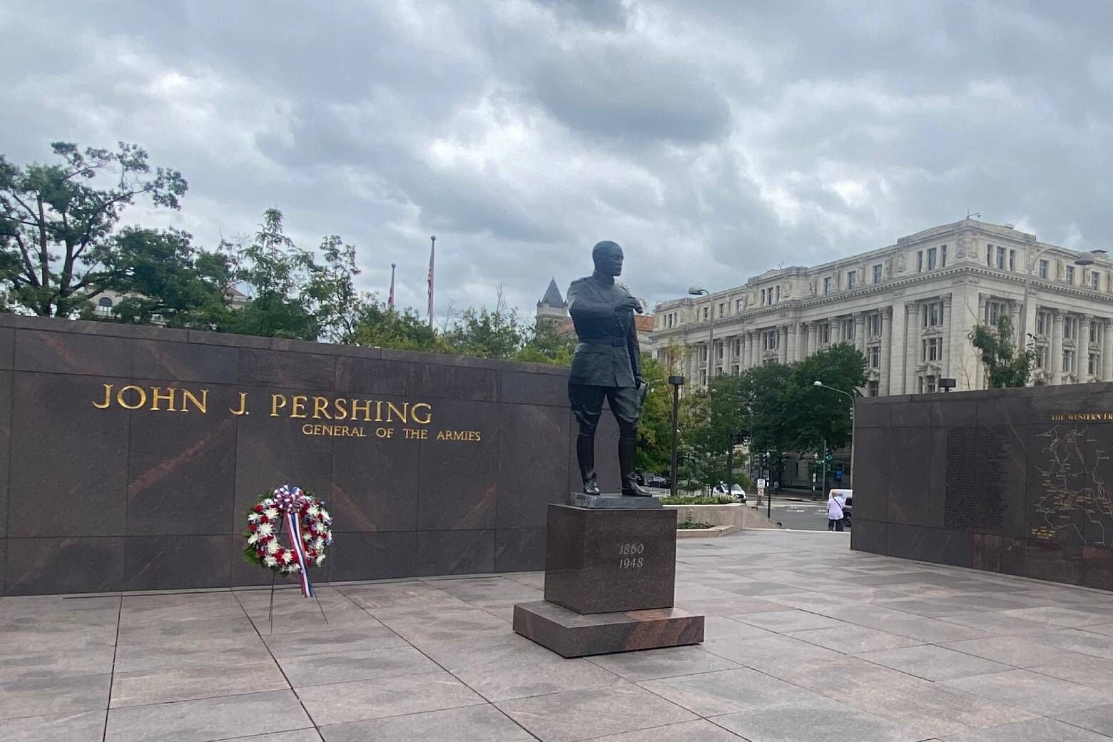 The new World War I Memorial in D.C. is a 3-acre site sitting along Pennsylvania Avenue between the White House and Freedom Plaza. The centerpiece is a 60-foot wall of sculptures, which aim to tell a story from the start of the war to the end. (WTOP/John Domen)