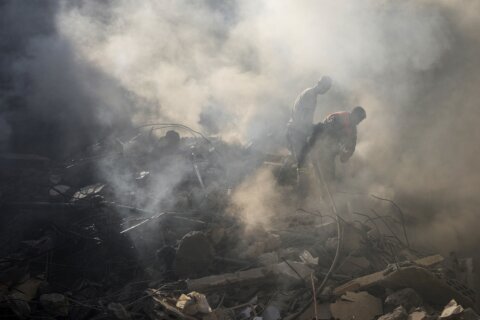 Israel’s deadliest strike in central Beirut leaves Lebanese stunned as they dig through the rubble