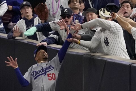 Yankee Stadium fans ejected after one pries ball out of Mookie Betts’ glove at World Series