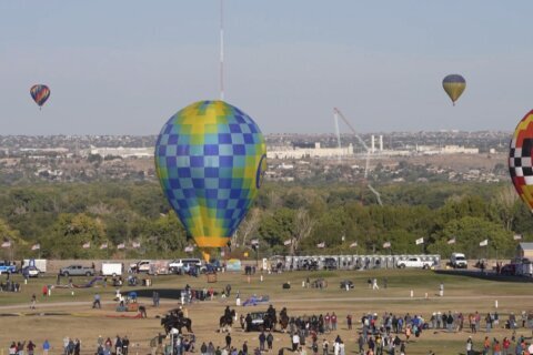 Hot-air balloon strikes and collapses radio tower in Albuquerque during festival