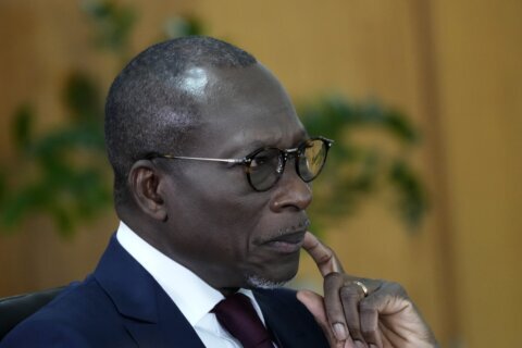 Two men close to Benin's president jailed after alleged coup plot