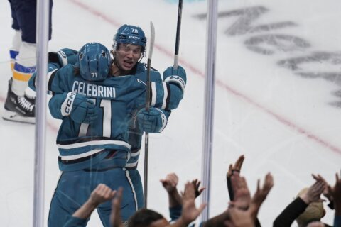 18-year-old Macklin Celebrini scores a goal in his hyped debut for the Sharks