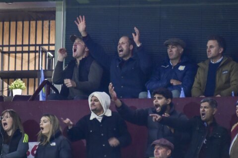 Days after being suspended Emi Martinez has Prince William celebrating in the Champions League