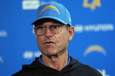 Jim Harbaugh misses part of Chargers’ win over Broncos for treatment of irregular heartbeat