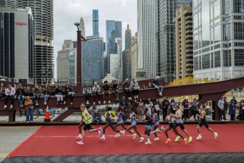 Ruth Chepngetich of Kenya smashes world record by nearly 2 minutes at Chicago Marathon