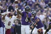 Jackson outduels Daniels and Henry runs for two TDs as Ravens beat Commanders 30-23