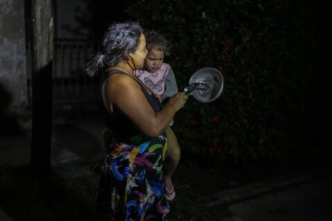 Cubans struggle with an extended power outage and a new tropical storm