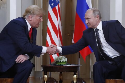 Trump-Putin ties are back in the spotlight after new book describes calls