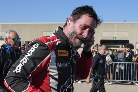 Keanu Reeves crashes at Indianapolis Motor Speedway in pro auto racing debut