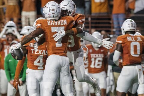 Texas apologizes to Georgia players, staff, SEC and game officials after fans throw trash on field