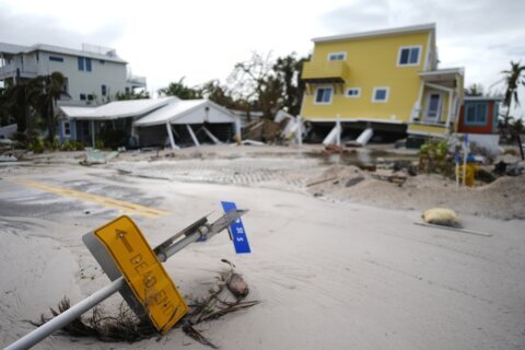 The Latest: Residents begin repairing damage from Hurricane Milton, which killed at least 10