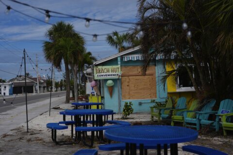 The Latest: Hurricane Milton lands near Siesta Key, Florida, as a Category 3 storm