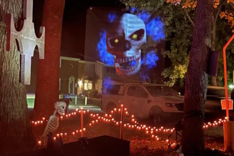 ‘They’re famous!’: Va. father-daughter duo’s DIY neighborhood Halloween display celebrates spooky season with a twist